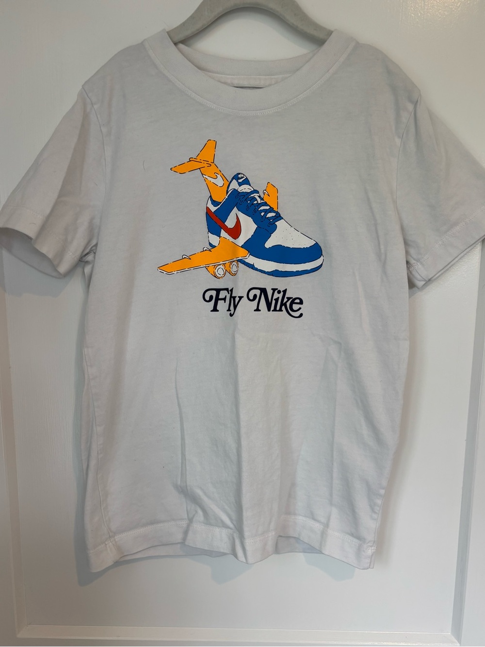 Nike Kids White Tee with Blue and Orange Sneaker Graphic